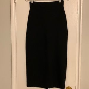 Like new Babaton tea length skirt with slit in the back.